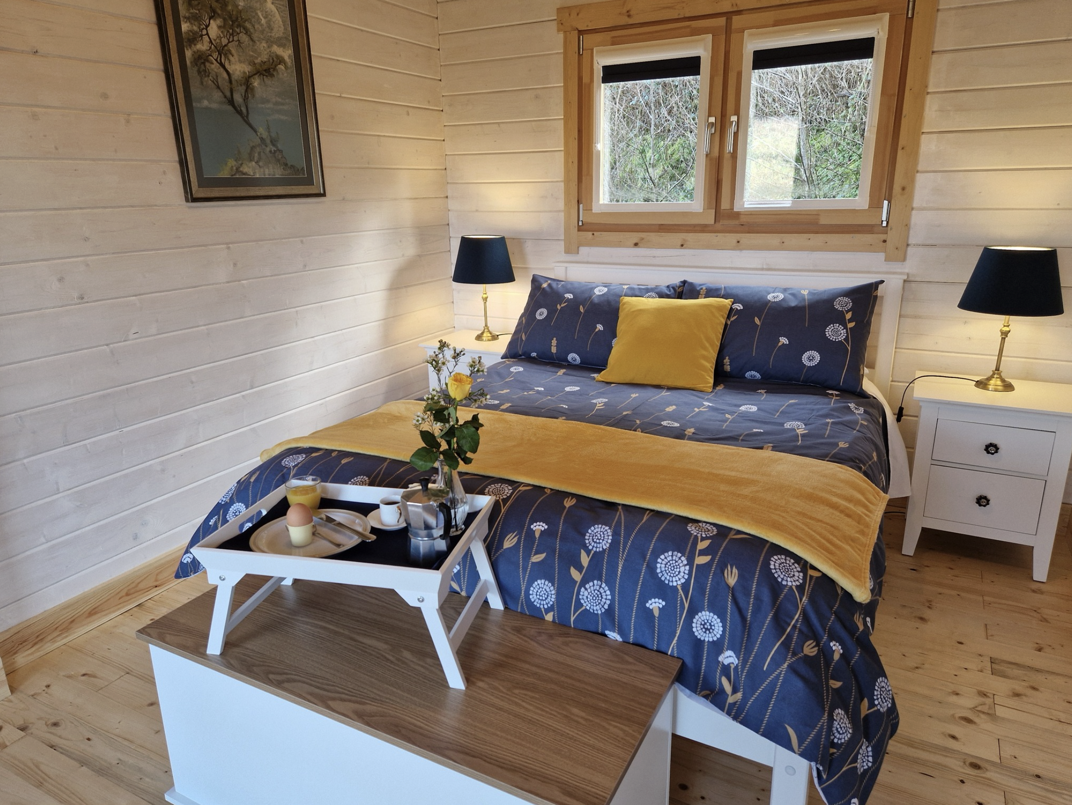 Primary double bedroom with crisp linens