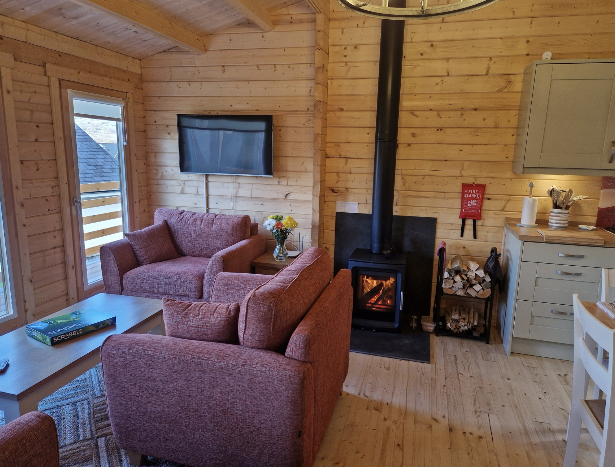 Cozy living area with woodburner